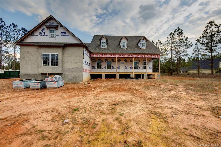 NOTE: "All Photos are "like house" that has already been built in the neighborhood. Great community with the serenity of country living at its best in Lauren Pines!  Quality new construction, 4BR, 3BA home w/lrg front porch. Over 3200 heated sq ft of living space, MBR  on main, w/sitting area, trey ceiling, walk-in closet, master bath w/ double sinks, separate shower, 2 other BRs on main. Bonus room up. Features HW floors, detailed picture frame & crown molding. All on an acre lot!