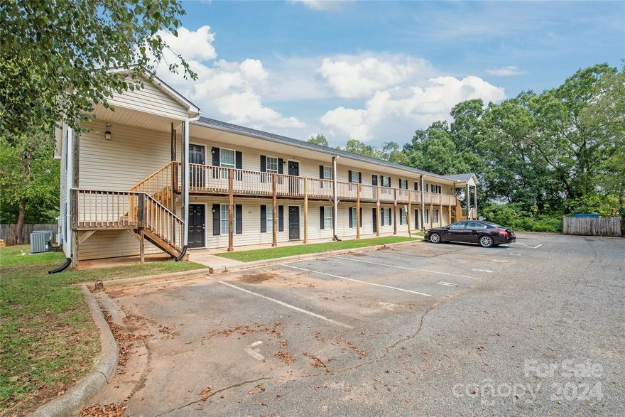 Exceptional Investment Opportunity! This 10-unit apartment complex in the heart of Concord features 2-bedroom, 1-bathroom units, each approximately 800 sq. ft. Eight of the units have been fully renovated with luxury vinyl plank flooring, granite countertops, stainless steel appliances, and modern cabinetry. Upper units boast new decks, while lower units offer private patios, enhancing tenant satisfaction. The remaining two units, one partially renovated and the other leased month-to-month, provide immediate value-add potential. Located in a prime area near shopping, dining, and major highways, this well-maintained complex offers stable cash flow with room for rental growth. Don't miss this turnkey investment in Concord’s high-demand rental market!