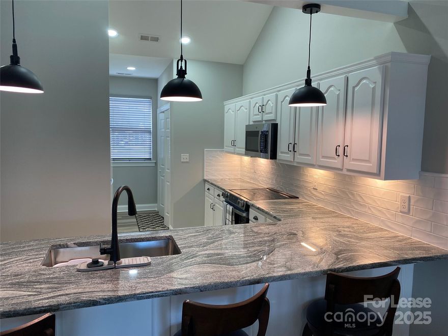 If you love brand new, this is the place for you.   Completely renovated.

Available Now Beautifully renovated 2-bedroom 2 bath unit in The Terraces, one of Denver, NC's beloved 55+ communities close to shops, restaurants, and Lake Norman. HUGE living area. Lovely waterproof vinyl flooring throughout - no carpet. New granite countertops and a large deep stainless sink. New ceiling fans and lighting. New appliances to include the refrigerator. Washer and Dryer are not new but they are included but not maintained by owner. The primary bedroom has a large walk in closet. There are 3 closets for coats and storage and a linen closet in the guest bathroom. The Terraces is a wonderful community with a clubhouse for social events and a large pond with walking trail. 1 small pet (under 25 lbs) with $500 pet fee. Water and Garbage Collection are included in the Rent.