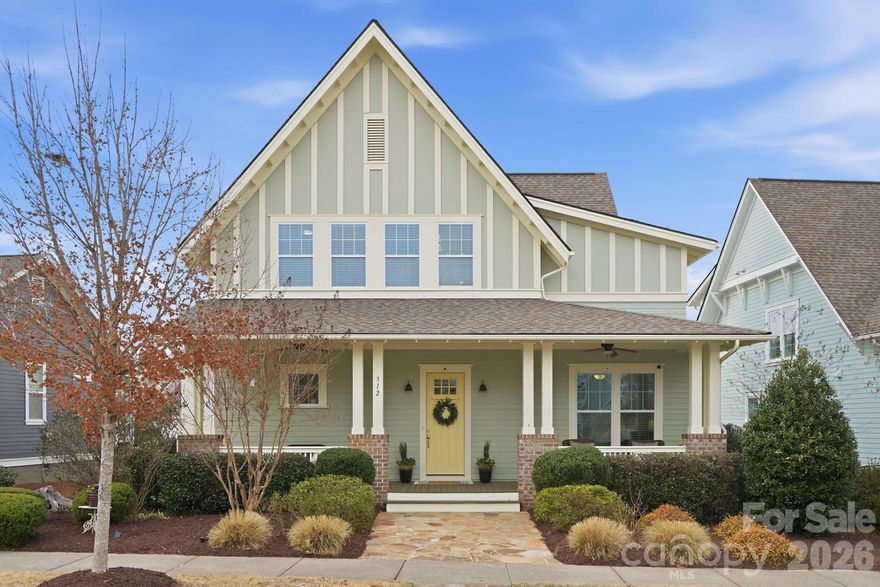 An EXCEPTIONAL opportunity awaits in popular Riverwalk! This NEWLY REFRESHED Saussy Burbank Arts & Crafts home is perfectly tucked away in one of the community’s MOST DESIRABLE POCKETS—just steps from a pocket park, green space with a firepit, and walking paths that lead directly to the Catawba River and miles of scenic trails. The ORIGINAL OWNERS have made this home truly MOVE-IN READY with updates completed in 2025, including fresh exterior and interior paint, a newly painted garage, stained front and back decks, refinished hardwood floors on the main level, new carpet upstairs, and a brand-new oven in the chef’s kitchen. The THREE-CAR GARAGE is an added bonus and a rare find in Riverwalk! Inside, you’ll love the open-concept floor plan filled with natural light, soaring ten-foot ceilings and elevated eight-foot doors.  The bright kitchen is a showstopper with an extra-large granite island, abundant cabinetry, stainless steel appliances, and a walk-in pantry—perfect for entertaining. The family room features built-in shelves, a cozy gas fireplace, and a wall of windows overlooking the backyard. A first-floor bedroom with en-suite bath offers flexibility for guests or a home office. Upstairs, the spacious primary suite boasts a large walk-in closet and a generous bath with dual sinks and high ceilings. Two additional bedrooms, a full bath, and a walk-in attic complete the second level. Enjoy outdoor living on the large, welcoming covered front porch or generous back porch overlooking a fenced yard with a patio—ideal for gatherings. Riverwalk’s amenities include a community pool with lazy river, clubhouse,  playground, BMX Supercross Track, velodrome, criterium course, local dining, wine bar, shops, and convenient canoe/kayak access. This golf cart-friendly neighborhood offers quick access to I-77, Rock Hill, Fort Mill, and Charlotte—making it perfect for commuters and those seeking an active lifestyle. Experience the best of Riverwalk living in this MOVE-IN ready charming home in the best section!