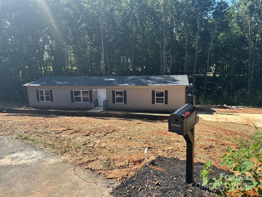 Brand New Luxury Home in Mooresville

Discover this brand new luxury home offering 2,040 square feet of thoughtfully designed living space on a spacious 1.14-acre lot. Nestled in a private setting just minutes from Lake Norman, this residence combines comfort and elegance with modern finishes throughout.

Inside, you’ll find an open floor plan perfect for today’s lifestyle, featuring a gourmet kitchen, stylish bathrooms, and a spacious primary suite with walk-in closet. An office that can be used as a flex space.  Large windows fill the home with natural light, while high-quality construction ensures lasting value.

Located in a fast-growing area surrounded by shopping, dining, and recreational amenities—with even more being built—this home offers both convenience and future upside. Enjoy easy access to I-77, Lake Norman State Park, and all that Mooresville has to offer in a rapidly exnding community.