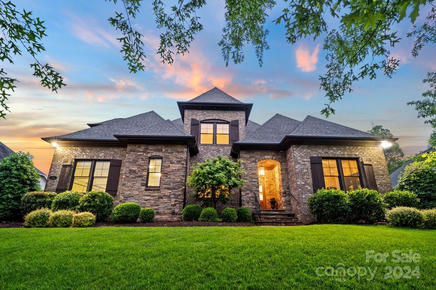 This meticulously designed all-brick Linnane home located in the sought-after Reserve section of River Run showcases exquisite molding, high ceilings, 8-foot doors, & elegant arched openings. The modern kitchen boasts a large island, farmhouse sink, double ovens, an expansive pantry, & a bright breakfast area. Flowing seamlessly into the great room, the kitchen extends to a large screened veranda offering stunning views of the beautifully landscaped yard. The 1st floor primary suite features a generous closet, spa-like primary bath, & private door leading to the screened porch. Additionally, the 2nd bedroom on the main level can serve as an office or guest suite w/ full bath. Upstairs, discover 3 more bedrooms, 2 full baths, & a bonus room. Tons of storage is available w/ 2 walk-in attics & a walk-in storage area. This home offers an exceptional blend of luxury, comfort, & style. Don't miss the chance to experience the luxury country club lifestyle w/ amazing golf, swimming, & tennis.
