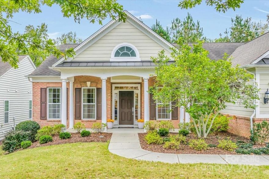 The floorplan you've been waiting for!! Step into this beautiful, OPEN ranch floorplan which rarely comes to market in Sun City (the *premium* Bluffton Cottage floorplan w/ extended sunroom option). Inviting three bedroom, two bath home with pristine hardwoods featured in main areas and brand new carpet in bedrooms. Spacious kitchen with natural wood cabinets (that compliment the hardwood floors), lovely tile backsplash, gas cooktop, wall oven & microwave, new disposal (2024) and new fridge/freezer in 2023! Great room with gas fireplace flanked by built-in shelves and cabinets with black granite countertops to match the kitchen. Adjacent is the sunroom, clad with high end grasscloth wallpaper and plantation shutters, overlooking the backyard which is rich in privacy with mature pine trees. Enjoy new lighting fixtures in main living areas, elevating each space and providing elegant ambiance. Generously sized primary bedroom suite with tray ceiling and fan, its windows bringing in beautiful natural light and pretty views of the backyard and deck. Primary bath has a garden tub, separate walk-in shower, dual sinks with vanity area, W/C, linen closet and a full walk-in closet. 2nd bedroom with full bath suite, also accessible via the hallway. 3rd bedroom with french doors currently being used as office/sitting room. 2 car garage with new door opener in 2025 and finished with epoxy floors.  This home is perfectly positioned on a cul-de-sac lot (no traffic), tucked deep inside the neighborhood in "The Meadows" area which provides peace and quiet. Enjoy the outdoors on the newly refinished large back deck with pergola. Amenity rich community of Sun City includes 3 swimming pools (1 indoor), 8 clay tennis courts, largest ballroom this side of uptown CLT, 8 pickleball courts (4 with cushioned surfaces), robust selection of clubs/groups to join and so much MORE! Come enjoy all that Sun City has to offer, and make this lovely home yours!