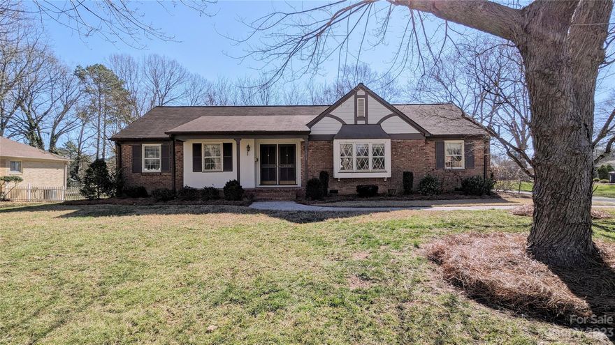 HARDWOOD FLOORS!SPACIOUS! ONE LEVEL!Fantastic well maintained single level ranch with tons of space! Have large gathering room with beautiful window overlooking front porch and yard also open to the dining area. The kitchen and breakfast nook are just a few steps beyond the dining room and beside the keeping room/den with fireplace. Fantastic flow for living and entertaining! The side entry is covered and leads into the mudroom/hallway with laundry and space for organizing.  Down the hallway from keeping room-3 nice sized BRs-2 full baths-one bath in hallway to share-another ensuite for primary bedroom that includes a dressing area.  The back door by keeping room leads to a patio and double covered carport as well as a huge back yard that is partially fenced for pets.Storage shed for tinkering/garden equip/plus an attached storage room -overflow gear for sports, golfing and etc..All of this waiting for your personal touches and just minutes from shopping, schools, and interstate!