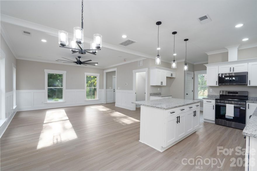 Brick new construction home with upgrades + private wooded lot under $300K—rare find in Albemarle.| USDA Eligible |  
This 3-bedroom, 2.5-bath home combines low-maintenance durability with modern upgrades and an open, functional layout designed for everyday living. The main level features a bright, open-concept living space with detailed moldings, a spacious kitchen with center island, and seamless flow for entertaining.
Upstairs, the primary suite offers a private retreat with a walk-in closet and en-suite bath, while two additional bedrooms provide flexibility for guests, a home office, or growing needs.
Set on a generously sized lot that extends into the tree line, this property offers added privacy and room to enjoy the outdoors—something buyers consistently struggle to find in newer homes.
Located just minutes from downtown Albemarle, with convenient access to shopping, dining, Stanly Community College, and an easy drive to Charlotte. Outdoor recreation is right at your fingertips with Badin Lake, Lake Tillery, and Morrow Mountain State Park nearby.