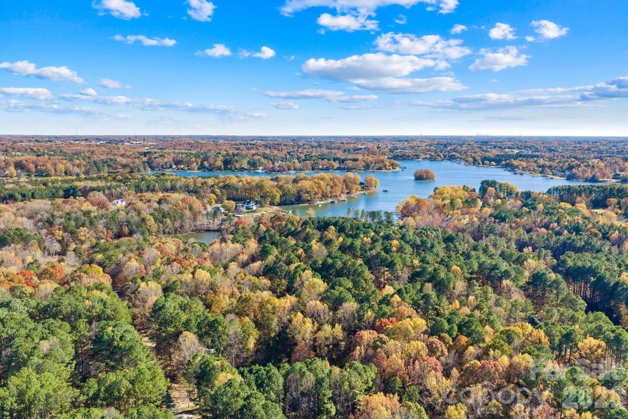 New Price!

Welcome to this charming 3-bedroom, 2-bath ranch home in Mooresville with NO HOA — perfectly positioned to offer privacy, convenience, and easy access to everything Lake Norman living has to offer.

Step inside to beautiful wood flooring, a bright and inviting main living area, and a thoughtfully designed single-level layout ideal for everyday living. The kitchen and living spaces flow seamlessly, creating a comfortable and functional environment for both relaxing and entertaining.

Additional highlights include an oversized one-car garage, whole-house water filtration system, and a spacious rear deck overlooking mature trees — the perfect setting for morning coffee, outdoor gatherings, or unwinding in a peaceful backyard retreat.

Located just minutes from Cornelius Road Park, the renovated Stumpy Creek Public Boat Landing, and only 10 minutes to Lake Norman State Park, you’ll enjoy convenient access to hiking, boating, fishing, camping, and swimming. Top-rated schools, shopping, dining, and I-77 are all nearby, making this location both practical and desirable.

Refrigerator conveys for added convenience.

With its new price and being sold as-is, this is an excellent opportunity to own a well-located single-level home near Lake Norman.