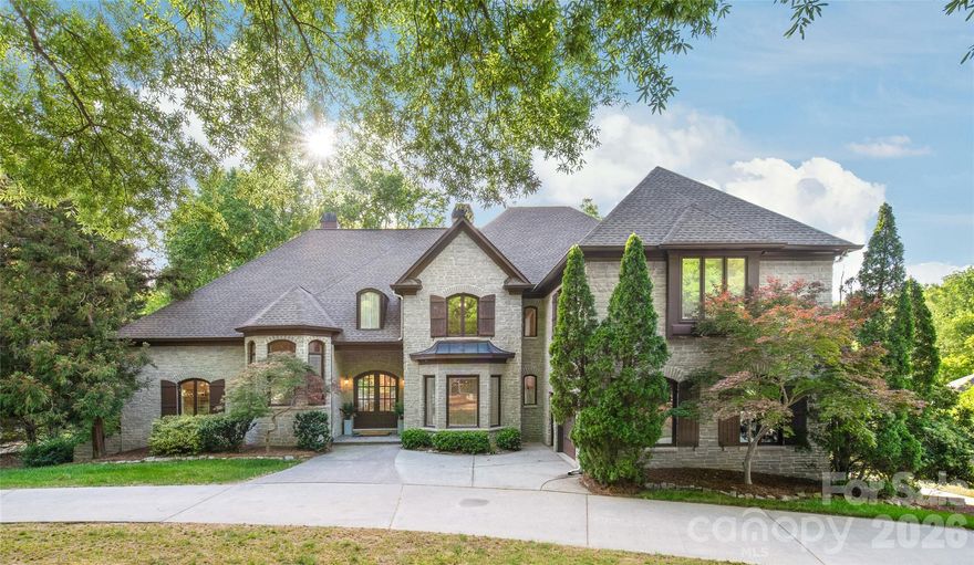 NOW OFFERRING A $75,000 
"CUSTOMIZE TO YOUR TASTES" DESIGNER'S CREDIT AUTOMATICALLY REDUCING THE PRICE ON ALL OFFERS MADE BEFORE MAY 10TH

Full Disclosure:
2 buyer's agents recently gave the feedback: "high-end buyers will say the house needs updating." And the other said "buyers will pay more for a home already in vogue."

Homes decorated "in Vogue" do exist from time-to-time, but are all $3-$5M (or more) for half the land and half square footage in less desirable locations for twice the price.
Ok, though, maybe they are right about the current fashions, but if they are, that observation just became your rare advantage. Obviously, for negotiating reasons here is what they don't want to point at: 1.27 private wooded acres backing up to a protected natural area, all inside the 485 loop. That stopped existing here thirty years ago. No contractor can construct this at any price in this corridor, ever again. Full castle-cut stone faces, foundation to roofline. Not veneer. A permanently protected nature reserve behind you. No developer. No variance. Ever. That treeline is legally guaranteed for your grandchildren and heirs.
Hand-carved Brazilian walnut floors from Amish masters whose mastercraft retired with them. Almost 7,800 square feet across three levels, with a self-contained lower wing. No HOA. Providence High: top 1% in North Carolina. Systems replaced. Influential neighbors.

3 Minutes: Whole Foods
Walkable: The Arboretum
15 Minutes: Greenway Nature Walk
16 Minutes: Uptown
20 Minutes: Blumenthal Performing Arts Theater

All of this at one address for under $3M does not exist, and may never exist again in the surrounding area.

The agents on both sides want you to spend more. They'll highlight the "en vogue" Homes for double the price (doubling their commission) and the moment the boxes are unpacked, you'll start laboring to undo it all to make it your own anyway. That is the "Turnkey Trap," the most expensive mistake in real estate of all, because you pay for it twice.
Finishes are the only part of a home you can change. Everything else on that list no longer exists in this market and is structurally irreplaceable at any budget. The market mispriced this estate. The owners priced it to sell fast. Those 2 buyer's agents mentioned "updating." This is where a visionary sees asymmetric leverage. You have just discovered the rarest arbitrage in South Charlotte real estate: Greyson Manor.

Against our team's urging, the owners decided to extend an overly generous and singularly valuable gift to speed this process:

Submit your offer by May 10th and receive an instant $75,000 "Customize to Your Tastes" Designer's Credit.

Turnkey buyers pay a premium for someone else's taste, then spend years customizing it anyway. You? You walk into a stone castle with someone else paying to make every surface sing your song. No construction loan. No three-year build. The heavy lifting is done: roof, HVAC, water heaters. What remains is not renovation, it is enjoying "Customizing to Your Tastes."

Greyson Manor on 1.27 acres: $2.2M net for yours, on land no one can build, with privacy no one can zone. You are not paying for a designer, they are. You are making your castle a fully self-expressed masterpiece of a home.

Fashion fades. Fundamentals are forever. Homes with this DNA (sovereign acreage, castle-cut stone, protected views) do not recycle through South Charlotte. They are handed down. The May 10th deadline separates those who recognize rare and precious value from those who will forever suffer the story of the one that got away.

This home will become legend. The question is whether you claim it for your legacy before someone else does. When the sun sets May 10th, the $75,000 will be granted to only one, and the opportunity for everyone else vanishes.

Private showings by appointment.
Welcome to the stately tranquility you've earned. Now proudly make this castle, distinctly your home.