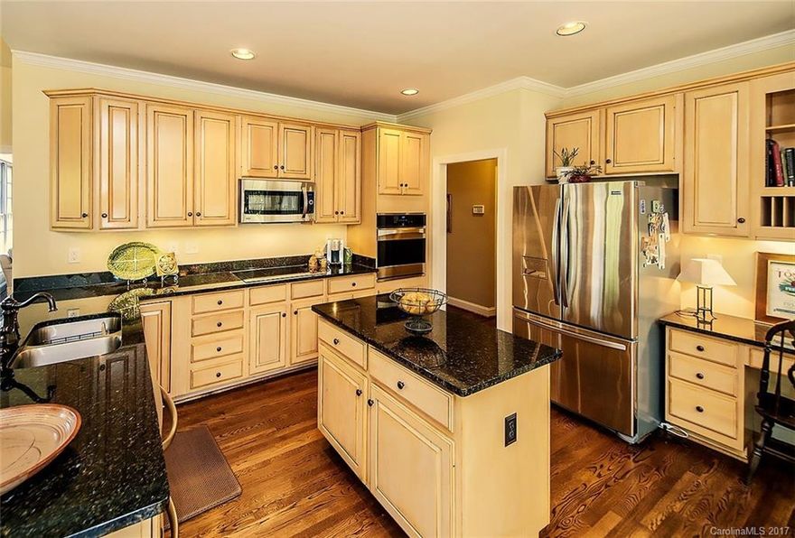 MAKE AN OFFER! SELLERS ARE MOTIVATED!! ELEGANT home in the desirable Carmel Country Club community! Enjoy the golf course views as you stroll through the neighborhood. Sip your morning coffee on the brick patio overlooking acres of woodlands. Separate upstairs guest bed and bath are perfect for college kids or mother-in-law. Open floor plan, vaulted ceilings, maple glazed cabinets, whirlpool jet tub, sealed foundation, new Heat/Air, GAF slate line roof, and more.  Great home and community.