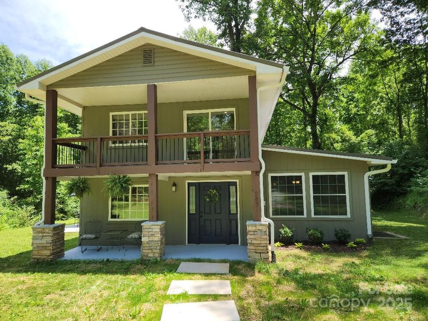 Lots of room to roam in this expansive house minutes to I-40 and downtown Marion.  Property sits on 0.62 acres and features a meandering creek.  Upon entering you will be greeted by an open floor plan with the living room area flowing into the dining and kitchen space.  Main level also features a laundry space, bedroom/family room and full bath.  Upstairs are two full baths and 3 bedrooms.  Two of the bedrooms feature a porch.  Everything has been freshly updated including 2 new HVAC systems, new flooring, total kitchen and bathroom updates.  Storage shed on property.  Ready to move in.  Lovely, end of the road, private setting.