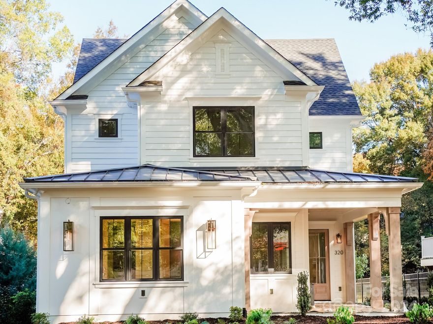 In framing Phase- Welcome to 320 Delburg, an exquisite custom home crafted by Plattner Builders, renowned for superior craftsmanship. This residence combines vintage charm with modern designer elements, creating a timeless yet contemporary living space. Discover a meticulously designed open floor plan, enhanced by classic styling and custom cabinetry. The gourmet kitchen, featuring top-of-the-line appliances, is a chef's dream come true. You'll find a primary bedroom suite on the main level, offering the perfect retreat. Designer lighting fixtures add a touch of elegance to every corner of the home, illuminating the exquisite craftsmanship and attention to detail. Situated in the charming town of Davidson, this home offers unparalleled convenience, with schools, shopping, and recreational facilities just a short walk away. Commuting with easy access to Interstate 77, allowing seamless travel to nearby cities. Located on the property is Davidson Land Conservancy's 001 Treasure Tree!