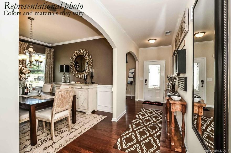 Ready in Dec.   Loaded w/upgrades like hardwood floors & ceramic tile.  Guest suite 1st floor w/full bath. Large loft, open kitchen w/lots of cabinets & counter space for those holiday meals, under counter lighting, bar counter top, granite, hardwoods, backsplash, S/S appliances, gas range, & pendant lights, and  glass front door.  Family room  opens to kitchen for family gatherings. Master with dual vanity, separate tub and ceramic tile shower, tile floors.  2nd floor open railings. These homesites have approximately 40'-50' in between homes offering privacy and lots of curb appeal. Be one of the first to get in to this new gem of a community that offers a sense of living in the country, yet only about 1 mile from 485.