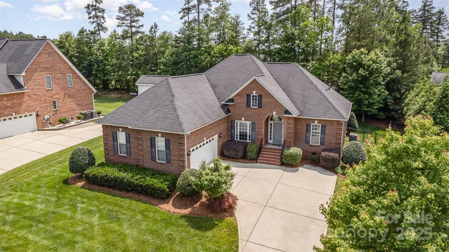 Updated, full brick home in the desirable Cramer Woods neighborhood! Enjoy the tree-lined backyard for a private retreat. Step inside to the freshly painted, inviting space with living room centered by gas fireplace and a ton of natural light! The kitchen has been refreshed with new quartz countertops, new lighting, updated hardware & convenient breakfast area. The main level features a split-bedroom design, with the primary suite tucked away for privacy- featuring hardwood floors, crown molding, a custom walk-in closet, dual vanity sinks, soaking tub, & separate shower. Two additional bedrooms on the opposite side of the home have new LVP flooring & added ceiling fans, connected with a shared bath. Upstairs, a spacious bonus room with a full bath offers great flexibility as a fourth bedroom or extra living space. Outside, enjoy large back deck, a fully fenced yard, & a stone patio- perfect for a firepit. Close to Lake Wylie, Daniel Stowe Botanical Gardens & so much more!