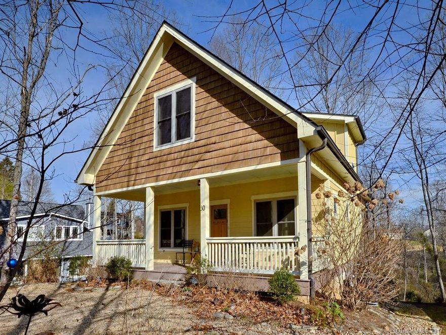 A 2010 "like new home" in West Asheville, just a stroll away to the New Belgium Brewery, River Arts District, and the lively West Asheville Haywood Road district. Fireplace on lower level in den with built-in bar and walk-out door to patio overlooking back yard with gardenias, etc.  +Large unfinished lower level storage. Front porch and 2 decks.