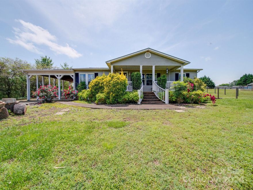 Nestled on a tranquil dead-end street, this charming ranch-style home offers the perfect blend of comfort and convenience. Situated on a sprawling .59-acre fenced lot, this residence boasts 1204 sq ft of well-appointed living space. One of the highlights of this property is the expansive shed, which can serve as a versatile workspace or a cozy recreational room, complete with a wood-burning stove for added warmth and ambiance. Located in a serene neighborhood, residents can enjoy the peaceful surroundings while still being within easy reach of local attractions. Explore the wonders of nature at Lake Norman State Park, just 6.7 miles away, or embark on a safari adventure at Zootastic Drive Thru Safari, a mere 1.8 miles from your doorstep. For wine enthusiasts, Davesté Vineyards is a short 4.6-mile drive, while downtown area of Troutman offers dining, shopping, and entertainment options just 4 miles away.