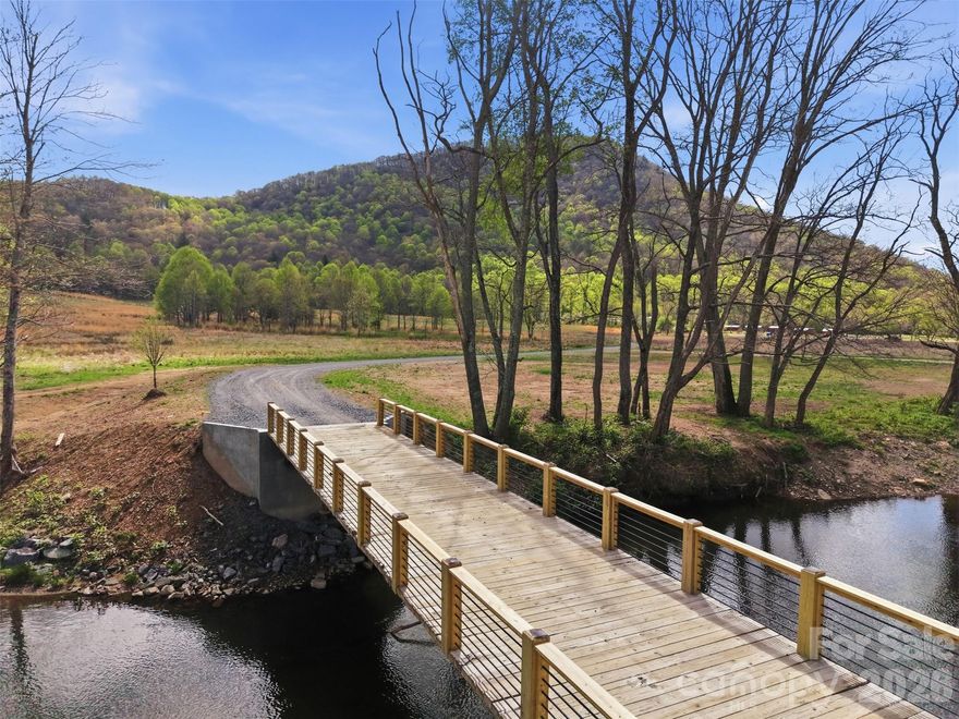 Highland River Estates – Entire Platted Community Offered as One Package A rare ±70-acre mountain
development opportunity in the heart of the High Country. Highland River Estates is being offered as a complete
community, including all platted homesites, road infrastructure, riverfront access, and long-range view parcels.
This is an exceptional chance for builders, developers, or investors seeking a turnkey project in one of North
Carolina’s most desirable growth corridors. Property Overview Highland River Estates includes: ±70 acres already surveyed and plated into spacious homesites. A mix of riverfront, long-range view, wooded, and mountain
parcels. Road system in place and ready for paving Utilities quoted and entrance signage ordered. Gated
community layout with natural privacy and scenic surroundings Phase 1 features flat, cleared lots, while Phase 2
offers inclined, sloping homesites for walkout basements and elevated view homes. A suitable vehicle is
recommended for the gravel road conditions. Development Potential This package allows the buyer to: Build out a
boutique mountain community. Create a portfolio of spec homes in a high demand market! Establish a retreat or
legacy estate. Capture premium pricing with riverfront and panoramic view homesites. Benefit from steady buyer
migration from Lake Norman, Charlotte, and out-of-state markets the groundwork is already in motion, making
this a true turnkey opportunity for those ready to build or invest. Lifestyle & Location Perfectly positioned for
year-round enjoyment of the High Country, the community offers convenient access to: Charming Mountain
towns Hiking, fishing, and outdoor recreation Wineries, breweries, and local dining Golf courses and seasonal ski
resorts! full-time living, second homes, or investment builds, Highland River Estates delivers the privacy, scenery,
and convenience today’s buyers seek. Additional Information Riverfront and long-range view parcels are limited.
Full plat, price sheet, and HOA/covenant documents available upon request. Owner Flexibility While the seller is
offering Highland River Estates as a complete ±70-acre community, the owners are also willing to sell individual
lots. Buyers may purchase the entire development as a package or select specific homesites based on preference.
Riverfront and long-range view parcels are limited. Contact listing agent for maps, lot layout, or walk the
property!