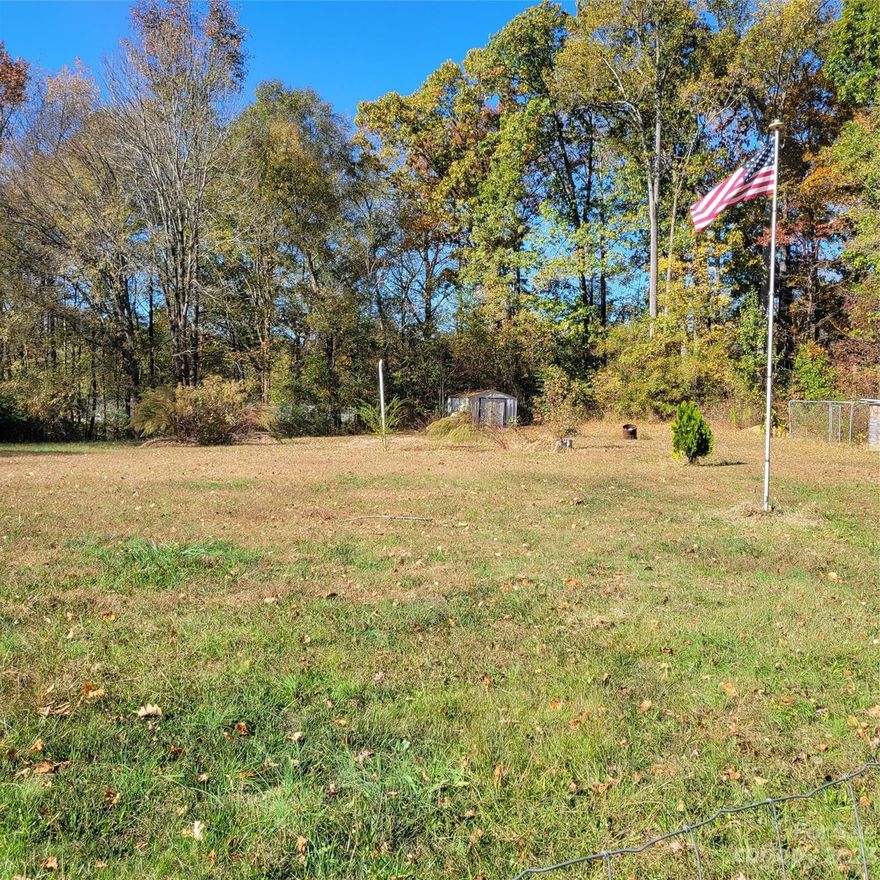 Beautiful 1.18 acre flat lot on the end of the road in a private setting, Cleared with well and septic already installed, NO HOA & Ready to be built on.