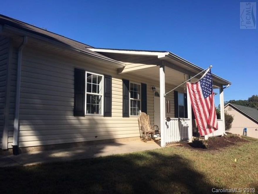 This is the house that you have been waiting for!  Spectacularly remodeled home close to downtown Glen Alpine but set back from the road to allow privacy!  This home features double master bedrooms (one is currently being used as a music room) and a newly renovated kitchen with stainless steel appliances.  Hardwood laminate runs throughout the open living space into the bedrooms.  The large great room with vaulted ceilings and gas fireplace is the perfect spot to entertain or cozy up for a quiet night by the fire.  Move in ready!!