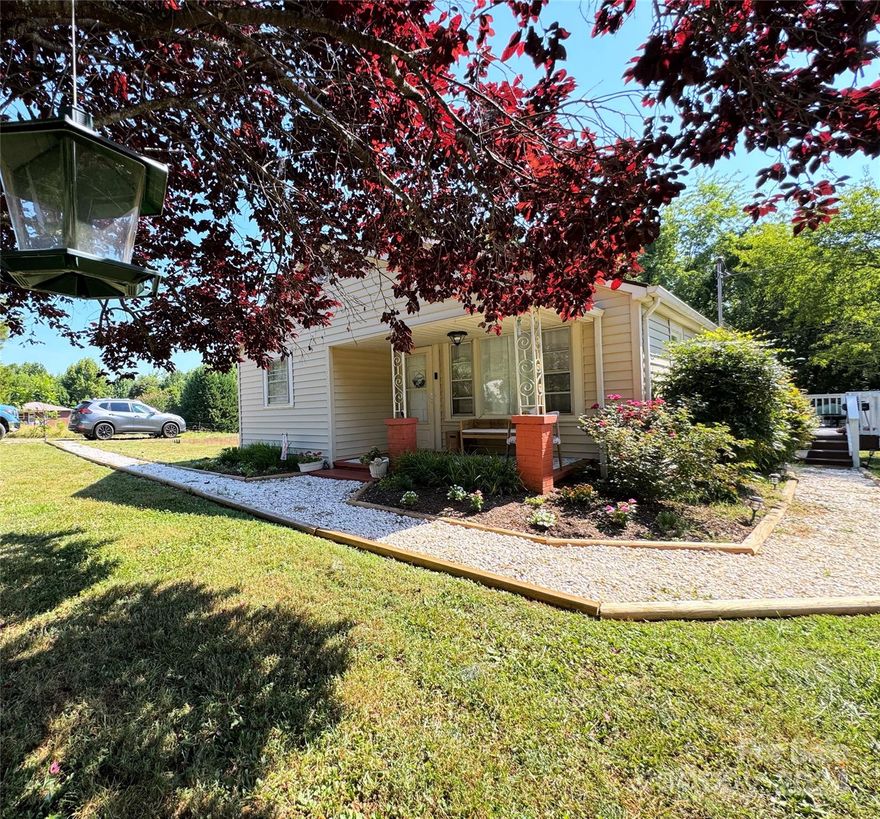 Cute 2 bed/1 bath bungalow in the Drexel area. Level and mostly cleared lot with woods at rear of property. Walk into the cozy living room with primary bedroom off to the side, continue into the flex area (currently used as playroom) with second bedroom off to the side. Kitchen, full bath and the laundry room make up the rear of the home. Side door to the deck is in the laundry room. Lights in both bedrooms and living room are smart bulbs controlled by Alexa. Fire pit and lots of room for outdoor activities!