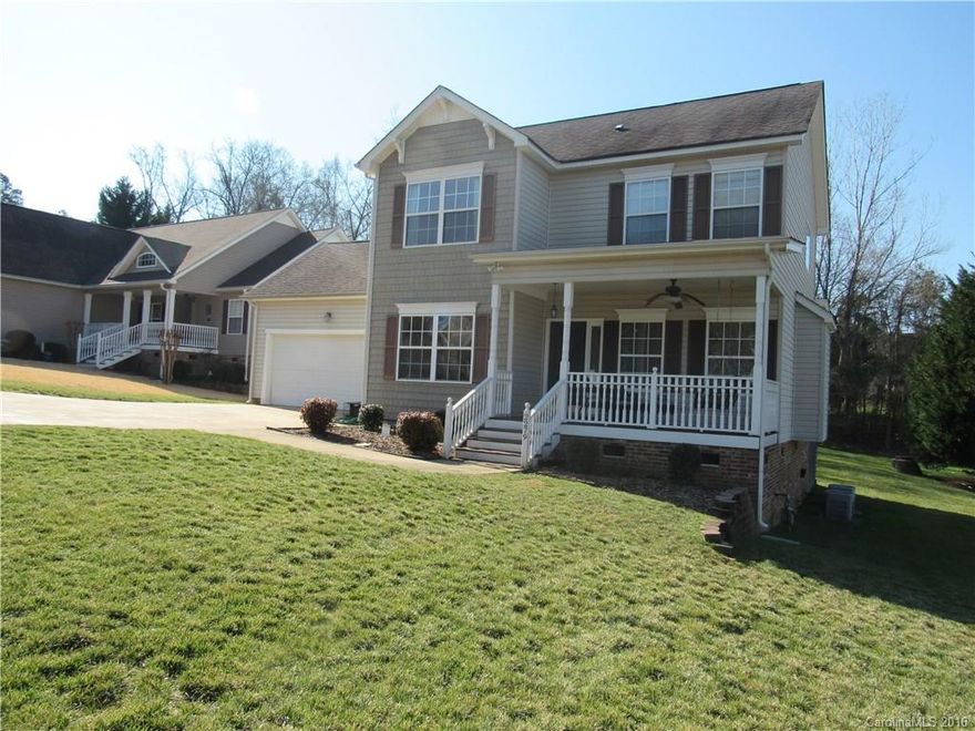 Come see this beautiful home with Rocking Chair front porch in the Quiet Creek community. Entire first floor is all hardwood floors.  Enjoy the spacious family room that is open to kitchen area with stainless steel appliances.  Off of the family room you can enjoy the large screened in porch and peaceful the backyard.  Upstairs you will find the Master bedroom and two nice sized secondary bedrooms.  You will not be disappointed in this home!