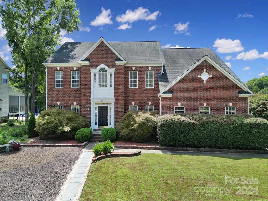 Welcome to this charming brick front home, situated on a large corner lot w/ a side load garage. The updated kitchen boasts stainless steel appliances, granite countertops, & a spacious butcher block island. The sunroom & morning-room feature vaulted ceilings & large picture windows, allowing natural light to flood the open floor plan. The sunroom & family room share a see-thru fireplace, while the family room features a built-in bookcase & bay window. The naturally lit foyer leads to the office or guest room, full bathroom, formal living & dining rooms, leading to a screened-in porch & patio. Upstairs, the primary has a tray ceiling, walk-in closet, & ensuite w/ a garden tub & shower. Four additional bedrooms & a full bathroom with double sink & linen closet complete this spacious home. Freshly painted walls, refinished hardwood floors & staircase, with new carpet make it ready for your personal touches.