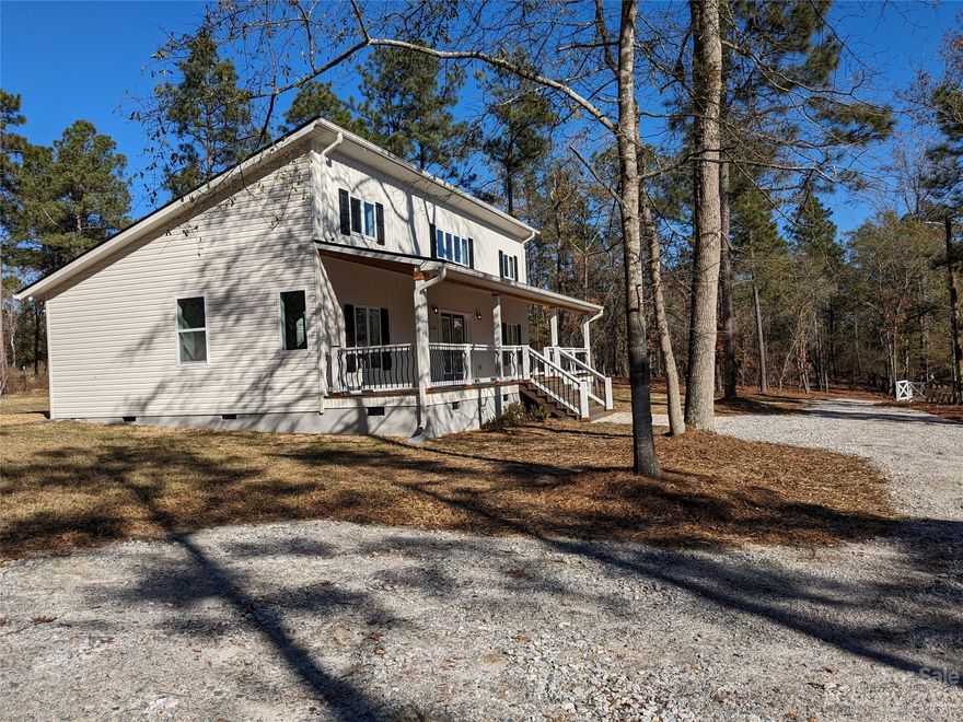 New Construction!

Country living in this beautiful new build on a 1.7 Acre fenced in country lot surrounded by acreage in Kershaw, SC.  1175 Square feet of interior heated space with high vaulted ceilings, and a 200 sq. ft deck with covered porch and lighting.  Open kitchen and living room areas.  Granite counter tops.  Comes will all new appliances and utilities.  2 Full Bath with tile, and new LVP flooring throughout the house.  Front porch framing members are wrapped in Cedar.  Private well and private conventional septic system.   

Located 5 Miles from Downtown Kershaw (down 341) & about 25 Minutes from Camden.  Located close to Abney Baptist Church.  Tom Gandy is a county maintained sand road.  Property has a wraparound gravel driveway. 

Seller is Real Estate Broker and Builder of Home.