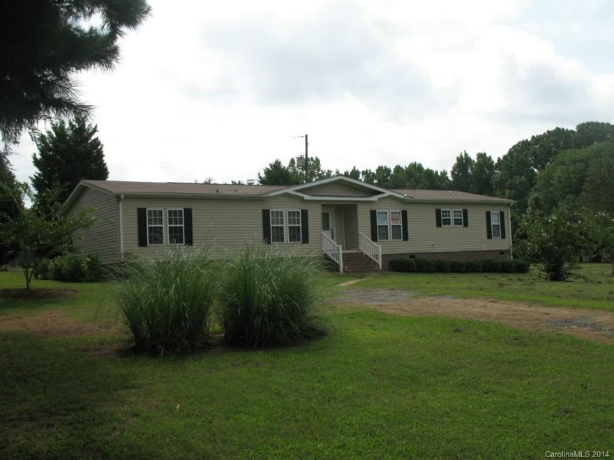 Huge 2300 Sq Ft Upscale Southern Energy 3 Bedroom 2 1/2 Bath Double Wide Great Room w/Stone Fireplace Island Kitchen with bonus sink in island and Lots of Quality Cabinets. Finished Drywall T/O Stipple Finish Ceilings Central Heat and Air / Heat Pump Northern Insulation New Carpet Glamor Bath with Garden Tub Separate Shower Separate His and Hers Vanity areas Huge Walk in closet Lots of Linen storage Coat Closet Upgrade Moldings T/O all on 2 private acres. Home in excellent condition.