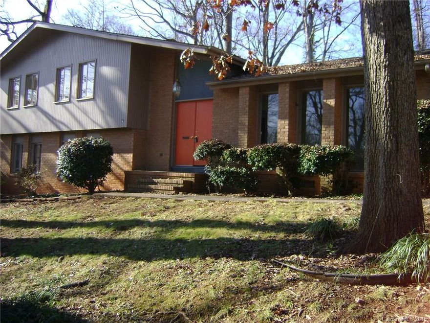 Mid-century treasure in Robinson Woods off Sardis Rd near Providence Day School. Minutes to Cotswold & Southpark. Updated eat-in kitchen with granite counters, new HVAC, large bedrooms, hardwood floors & huge family room with built-ins. Floor to ceiling windows in the living room, french doors leading to the dining room. Cedar lined closet in one bedroom. Plenty of storage in attic and shed, large laundry room.  Great back yard with plenty of room to play with expansive decking.