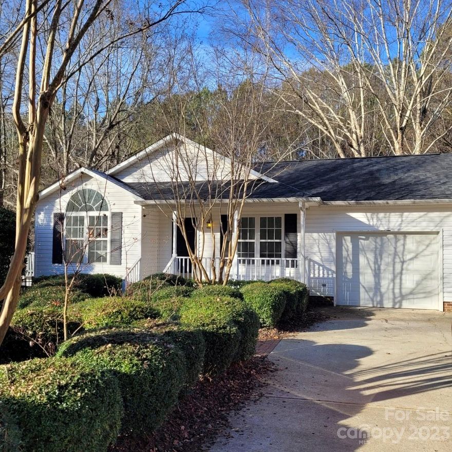 Ranch home on .38 acres. Partial fenced yard. Mature trees and landscaping. There is a gas log fireplace in the living room It has not been used. There is no propane tank connected to it. The Primary bedroom has a door to the covered back deck. There is an open deck off the kitchen on the side of the house. A new roof and gutter guards were installed in 2022. LVP flooring in the living room, hallway and one bedroom.