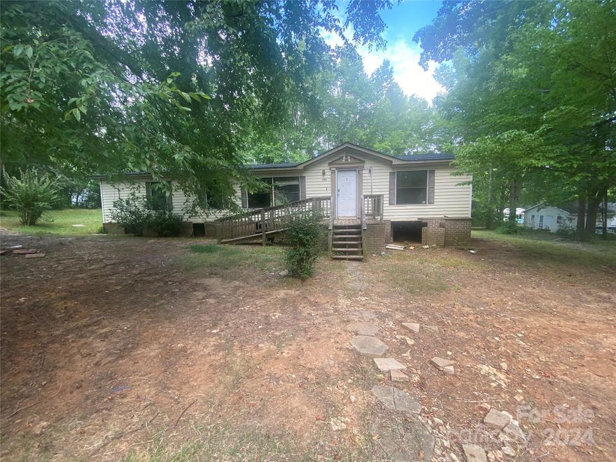 Attention Investors! Here's a fantastic opportunity to own a 3-bedroom, 2-bathroom Doublewide Mobile Home, sitting on over 1 acre of land, waiting for your finishing touches. Boasting 1562 square feet, this property features a cozy fireplace and comes with substantial updates, including a new roof and new subflooring. While it needs some TLC, renovations have begun, paving the way for you to add your creativity to the mix. Positioned in a desirable area, this is the perfect project for those looking to invest and customize. Don't miss out on the chance to transform this house into a lucrative investment or a dream home. For sale now – come see the potential!
The land can also be subdivided which gives you the ability to build multiplies homes for a great ROI!!