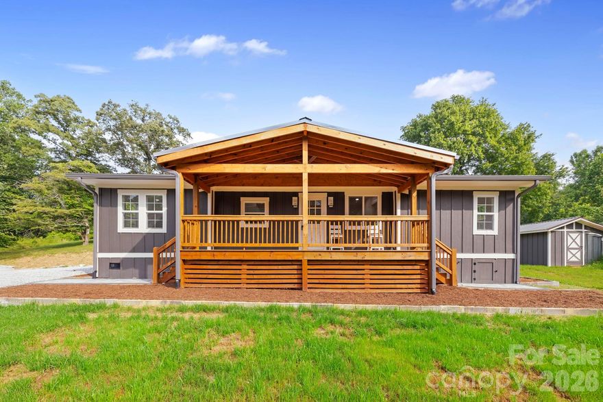 PRICE REDUCED AND MOTIVATED, BRING YOUR BUYERS! Charming 3BR/2BA Updated Home Just Minutes from Downtown Brevard! This beautifully renovated home offers the perfect blend of comfort, style, and convenience—all just a short drive from downtown Brevard. Tucked away on a quiet, state-maintained road (no winding driveways here!), this move-in ready home features a thoughtful mix of tile and luxury vinyl plank flooring, granite countertops, custom tile showers, fresh sheetrock and trim, and updated lighting throughout. Step outside and enjoy two covered decks that overlook a spacious, well-maintained yard ideal for relaxing, entertaining, or simply soaking up the peaceful surroundings. There's plenty of room for parking and a charming shed for all your extra storage needs. Located near the iconic Pisgah National Forest, this home provides easy access to some of the best mountain biking trails, scenic hikes, and stunning waterfalls in the region. Embrace the vibrant small-town lifestyle of Brevard—come and see today!
