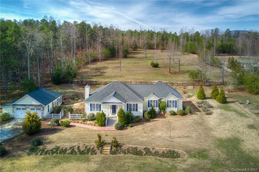 Lovely 3 BR/3b 2700 sf home has been completely renovated with high quality finishes and fixtures. Beautifully landscaped. High ceilings, crown moldings and antique pine flooring throughout. Spacious master suite with huge walk in closet, built-ins, new master bath with glass shower and Kohler soaking tub. 2 car garage w/equipment bay and potting shed. Artist studio/workshop could be guest quarters. Acreage is flat with established pasture and some fencing. Horses allowed. Taxes reflect 2nd home