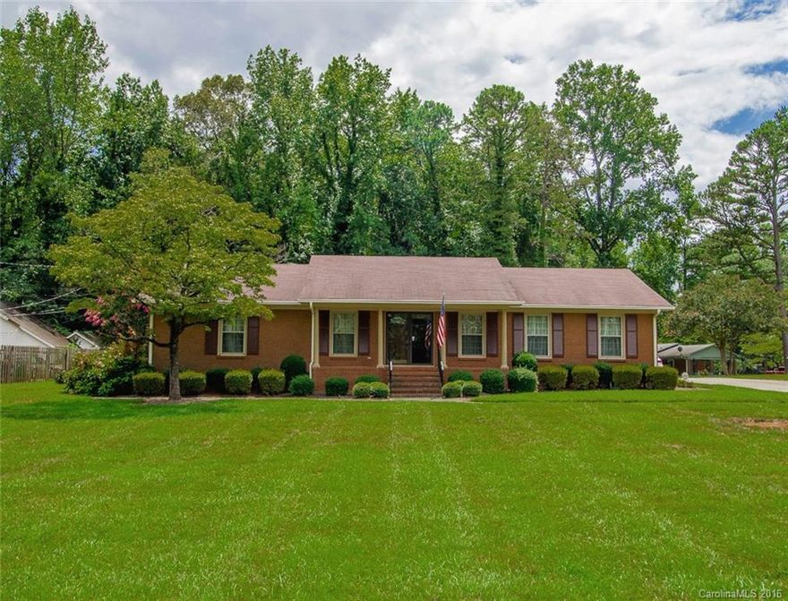 A quality built home which has been cared for and shows great pride and ownership. Beautiful, spacious, flat lot with trees on over.55 acre. Spacious rooms,granite counter tops in kitchen, tiled baths. Double sinks in hall bath. New windows. All brick.