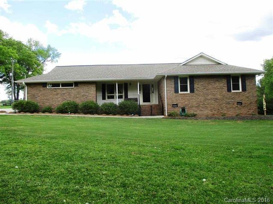 Custom brick home, however, stripped to bare bones & redone THIS IS A MUST SEE PROPERTY 3BR/2BA, kitchen/dining, den w/fireplace, office, sunroom. finished heated garage & storage room containing double ovens, sink & washer/dryer area, granite counter tops on all cabinets, covered patio area. approximately 2 acre pond, Equipment shed, 20x40 shop w/gas pack, cabinets, shower, sink, water heater, washer hook-up Kennel with dog house. Barn, 3 separate pastures, over 12 acres bordered by creek