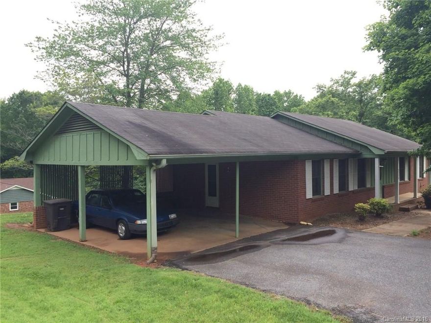 Brick ranch w/ basement on 1/2 acre lot, conveniently located to everything comes with a seller paid 1-year home warranty.  Main level includes kitchen open to breakfast area, huge formal dining room, 2 full bathrooms, 3 spacious bedrooms.  Master has it 's own bath and a walk-in closet.  Basement level includes 1/2 bath & small finished area, previously used as a salon.  It also offers storage and workshop space.  Basement is accessed from inside home or exterior garage door. Double carport