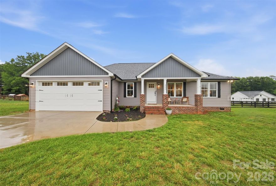 Like new sitting on 2.5 acres. This gorgeous home features 3 bedroom 2 full bath plus a private office and an open floor plan. Spacious great room, large dining area for your farmhouse table. A must-see white kitchen with plenty of cabinet space with quartz countertops, tile backsplash, nice size pantry & stainless appliances, upgraded lighting fixtures and a huge island great for entertaining. Large primary bedroom for your king size bed, wonderful walk-in closet & lovely primary bathroom with double vanity, tile surround in your deep soaking tub and more. Nice size laundry room. Wonderful rocking chair front porch. This home has many upgrades. Wired for a generator connection with a pad to hold the propane tank & a generator. Nice storage building with an extra carport for storage, nice wood fencing & a home water filtration system. 2 car spacious finished garage with storage space. 
This lovely home won't last long. Don't miss out on this one!