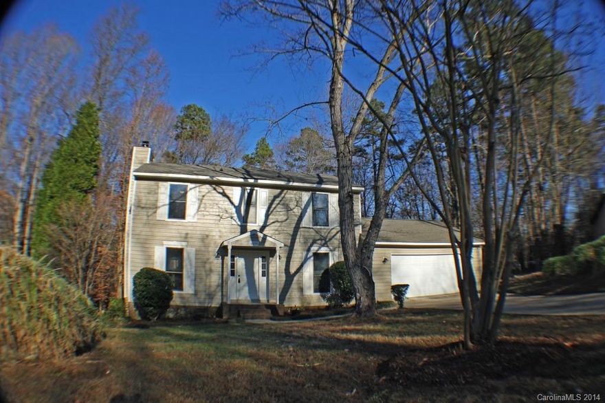 Someone is going to have a great Christmas!  COMPLETELY 100% RENOVATED HOME - New roof, New HVAC, New flooring (Laminate), New Carpet rooms, New Stainless Steel appliances, 3 bedrooms, 2.5 baths, 2-car garage, 550 stunning deck overlooking .37 acre parcel with beautiful trees.  Entire home freshly painted, new fixtures, outlet, switches, doors, vanity, etc....  House shows incredible, please see pics so you can see what I mean.  Agent is related to Seller.