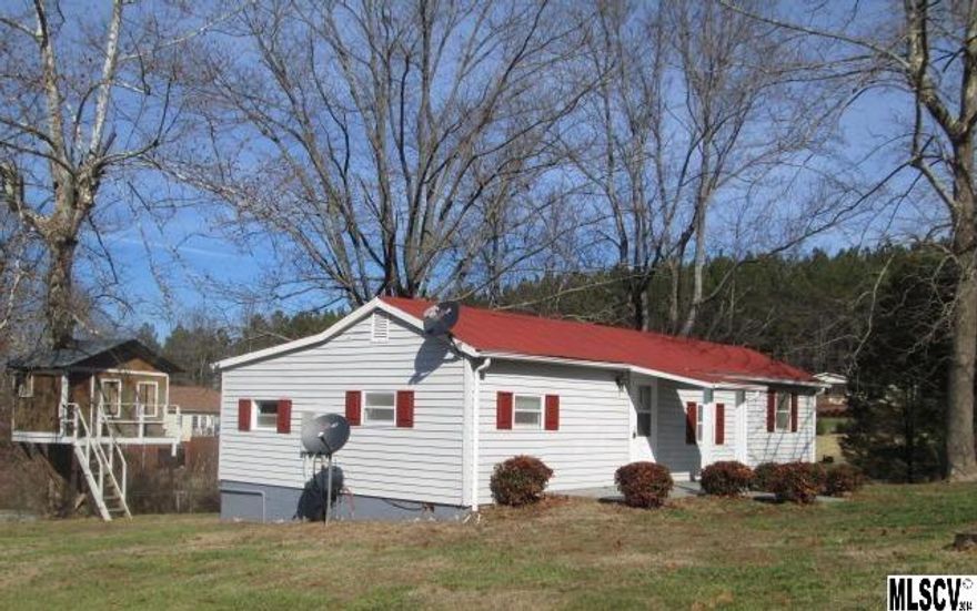 Cute as a button! Country cottage located on .78 acre lot just off of Highway 10.  Low maintenance vinyl exterior with large front porch. The unique floor plan is perfect for singles or small families and would also make excellent investment property. The large detached carport could easily be enclosed and become a garage and/or workshop. A must SEE! This is a Fannie Mae Homepath property.
