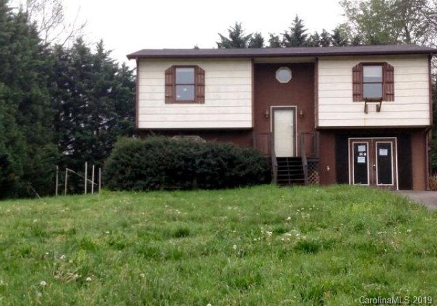 Lots of potential for this split foyer located just off Hwy. 18N. The upstairs has a spacious living room, 2 bedrooms, 1 full bath and a Florida room. The basement area has a living area, 3 additional rooms as well as a 1/2 bath. Property being sold in As-Is condition.