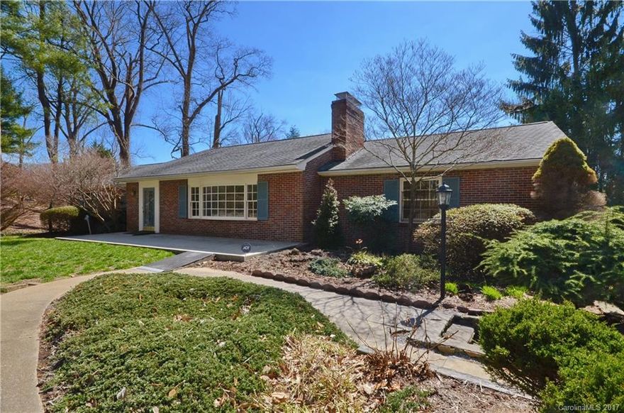 AS IS. Large brick ranch in lovely mountain setting ready for your cosmetic updates! Newer roof, hardwood floors, enormous family room, big sunny backyard & mature landscaping. Nearly 3000sq.ft. on main level w/add'l 1700+sq.ft. below not in total sq.ft. count (ceiling height 6'11.5'' w/current carpet). Basement could easily be separate apartment w/2 BRs. Very desirable area of neighborhood, so convenient to highly ranked schools & all South Asheville amenities. Huge lot! More pics coming soon.