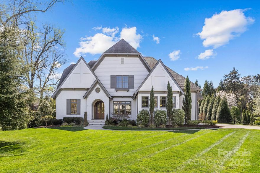 LUXURY LIVING IN FOXCROFT WOODS!  This spectacular home exudes luxury and sophistication.  Desirable floorplan for effortless entertaining and everyday living.  Show-stopping chef’s kitchen with island and walk-in pantry open to spacious fireside living room with coffered ceiling and sunny breakfast area.  Dining room, powder room and study with built-ins.  Primary suite with vaulted ceiling on main with ensuite bath with double vanity, shower, soaking tub and walk-in closet.  Laundry room, drop zone and full bath (near pool area), also on main.  Four additional bedrooms, three full baths, bonus room, flex room and study niche with built-in desks, upstairs.  Extend entertaining outdoors on the covered porch, overlooking the beautiful saltwater pool, hot tub, private backyard with firepit and trail.  Parking for three in attached garages.  Lots of storage space in walk-in attic.  Convenient to shops and restaurants in both the SouthPark and Myers Park areas and easy commute to Uptown.