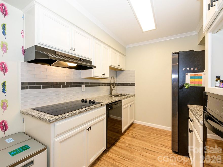 Live on the Little Sugar Creek Greenway and enjoy the perfect blend of nature and convenience. Walk or bike with ease to dining on Montford or shopping at Park Road Shopping Center—this sought-after lifestyle is truly hard to find.
Step outside and find the greenway quite literally in your backyard. Open your sliding glass door to a serene pebble-tiled patio, the perfect place to unwind while taking in beautiful, peaceful views—also enjoyed from the primary bedroom.
This home was fully updated in 2022 and is completely move-in ready. The stunning kitchen features a cooktop, wall oven, and smart refrigerator, combining style with modern functionality. The seller is also including a stackable washer and dryer for added convenience.
Don’t miss this rare opportunity to own a home where comfort, style, and location come together effortlessly.