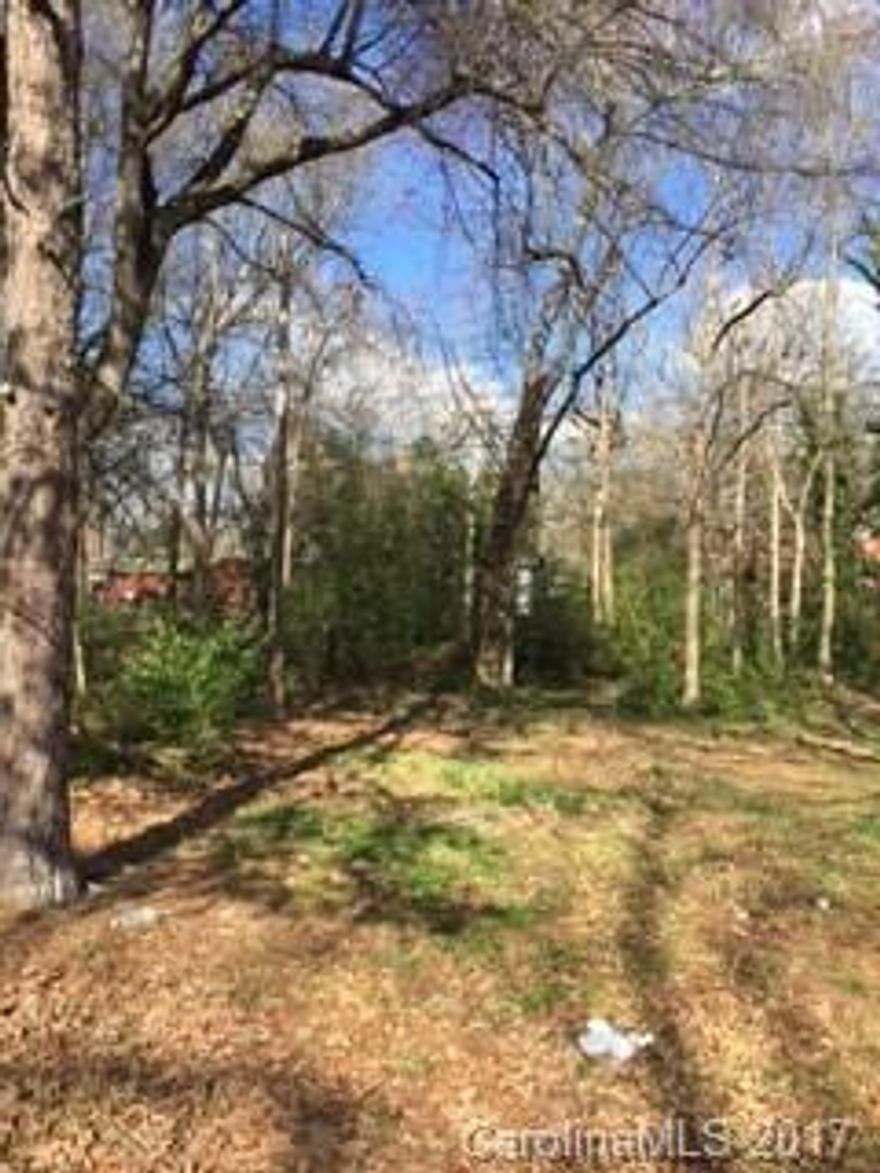 Residential lot in Monroe in established neighborhood.  Lot has mature trees on quiet street, perfect to build a home.