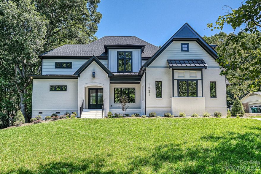 Beautifully built custom home by Ashland Custom Homes is tucked away in a quiet residential community in Matthews. This executive property sits on a large wooded lot with a swimming pool/spa and is perfect for entertaining. The open floor plan has 10'ceilings on the main and 9'ceilings upstairs.  The custom kitchen includes a large island, SS appliances, custom cabinetry, and a walk-in pantry. The dining area is perfect for every day use as well as more formal dining. The Primary bedroom is on the 1st floor with view of beautifully landscaped backyard. Upstairs you will find 4 additional bedrooms, a flex room, large landing & 2 bonus room spaces. The home is Energy Star Certified, has maintenance free insulated Anderson 100 series windows, tankless water heater, multi-zoned HVAC w/ gas furnace, 3.5"site-finished oak hardwood floors on main. 
Carpet in upstairs bedrooms/bonus room.  Home also has 3 car garage, first floor has custom drop zone, laundry with direct access to backyard.