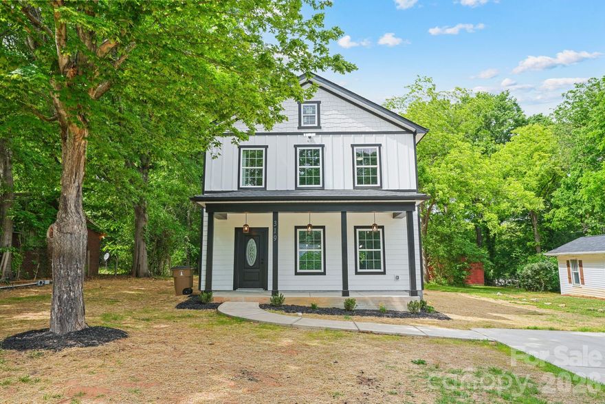 Welcome to 319 Grice Street!
This beautiful new construction farmhouse, featured by IU Construction, blends classic rural charm with modern design and finishes. The exterior showcases clean lines, board-and-batten and horizontal siding, architectural shingle roofing, and an inviting covered front porch accented with wood post and lantern style pendants—perfect for enjoying outdoor living and a summer evening. Large windows and timeless details create warm, refined curb appeal.

Inside, the farmhouse character continues with an open-concept floor plan designed for today’s lifestyle. Spacious living areas feature elegant shadowbox trim that lines the walls and flow seamlessly into the kitchen and dining areas, making this home ideal for both everyday living and entertaining. The kitchen truly serves as the heart of the home, offering stylish cabinetry, a large center island, granite countertops, and stainless steel appliances.

Thoughtful details continue throughout with custom closet shelving in all closets and the laundry room, providing both functionality and organization.

Overall, this new construction farmhouse offers the perfect balance of comfort, functionality, and timeless style—delivering the charm of a traditional farmhouse with the efficiency, layout, and finishes of a modern home.

Conveniently located near shops, restaurants, schools, and downtown Shelby, this hallmark small town offers a simple, grounded lifestyle—one that values relationships, tradition, and a true sense of belonging. This is a place where life moves at a gentler pace and familiar faces quickly become friends. With an easy commute and everyday conveniences close by, life here feels effortless.

Come enjoy a relaxing lifestyle at 319 Grice Street—just waiting for you to call it home.