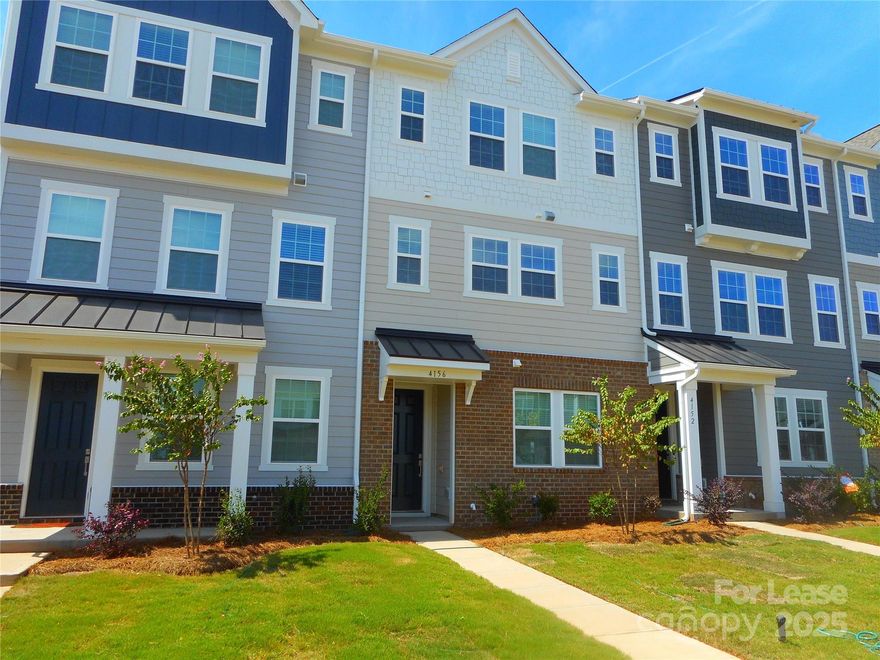 Brand New - Never lived in Large Fort Mill townhome with 3 bedrooms, 3.5 baths and a massive 2 car garage! Right at 2300 square feet this property is loaded with upgrades. Bedroom with full bath on main level - second floor has modern gourmet kitchen, dining area and large living room with exterior balcony that has 2 storage closets. Upstairs has primary bedroom and walk in closet and big bathroom. Cozt loft area along with secondary bedroom. washer and dryer included. Close to lots of shopping and restaurants.