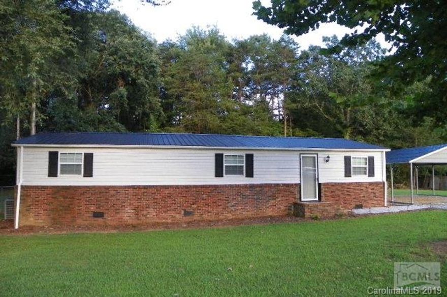 Just bring your furniture and enjoy this renovated 3BR/2Ba doublewide home situated on one-half acre+/-.  Current colors make this home very appealing. Kitchen updates include new Oak cabinets and appliances. Enjoy entertaining on the 12' x 25' deck on back of home. Detached double carport.  Seller related to listing agent.