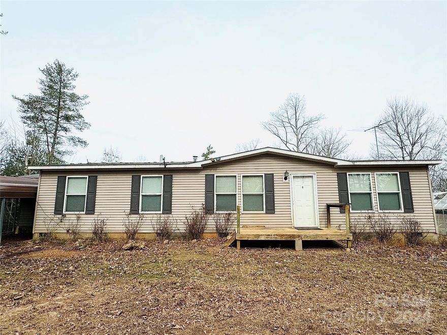 Welcome to your secluded oasis nestled on 16 acres of serene privacy! This charming 3-bedroom, 2-bathroom home boasts an inviting open layout, spacious living area and large kitchen with island. Relax in the comfort of your primary bedroom complete with en-suite bathroom & walk-in closet providing ample storage. Two additional bedrooms and two additional flex space rooms offer versatility for guests, a home office, or hobby space. Step outside to discover your own personal paradise, with rolling hills, a pond and endless possibilities across 16 acres of private land. The home has a workshop & shelter which provides ample space for projects and storage. Embrace sustainable living with your very own greenhouse, perfect for cultivating your favorite plants & gardening year around. Property also has 1000 ft of river frontage so if you're seeking tranquility, space to explore, or a place to pursue your passions, this property offers it all.