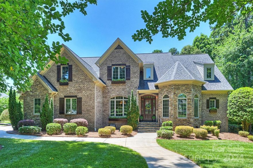 Welcome home to this gorgeous former builder's personal home on almost 1 acre lot with lots of custom details in the gated community of Quintessa. Highly sought after Weddington schools! Quality build is evident as soon as you enter the 2-story foyer with heavy Triple crown moldings. Custom handcrafted cabinetry and niches throughout. Gourmet Kitchen with Granite countertops, large kitchen island, S/S appliances. Open Floor plan with 2 story GR with natural light coming though Velux Solar tube. 2 Fireplaces, Keeping Room has stacked Stone floor to ceiling. Amazing office on main with high coffered ceilings. Enjoy your morning coffee or evening glass of wine on your private back porch with serene views of your heavily treed lot. Main floor primary suite with illuminated Tray Ceiling, dual walk-in closets with whirlpool tub and separate shower. Upstairs you will find 3 spacious BRs with a large Bonus Rm and 2 full baths that are interconnected. Lots of unfinished walk-in attic space.