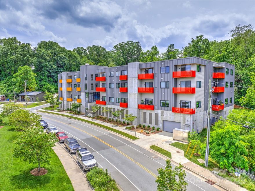 Live among several of Asheville’s most vibrant areas, across from New Belgium Brewery and around the corner from Haywood Street, walking distance to W. AVL and the RAD. This stylish condo is steps from farmers markets, artist studios, food trucks, music venues, restaurants & MORE. Complete w/ modern touches, 9-foot ceilings, an open layout, quality fixtures and thoughtful choices. Enjoy a private balcony w/ views of trees and native plantings. Primary suite offers large closets and a stylish ensuite bath. The second bedroom works great for guests, or a home office. With easy access to Downtown, this place checks all the boxes for city living with a creative twist. With the ability to rent for a minimum of 3 months it is a smart investment for anyone looking to generate rental income in one of Asheville’s hottest neighborhoods without disturbing neighbors with short term renters. The sellers have made many improvements and upgrades since purchase - see the Snapshot attached in MLS.