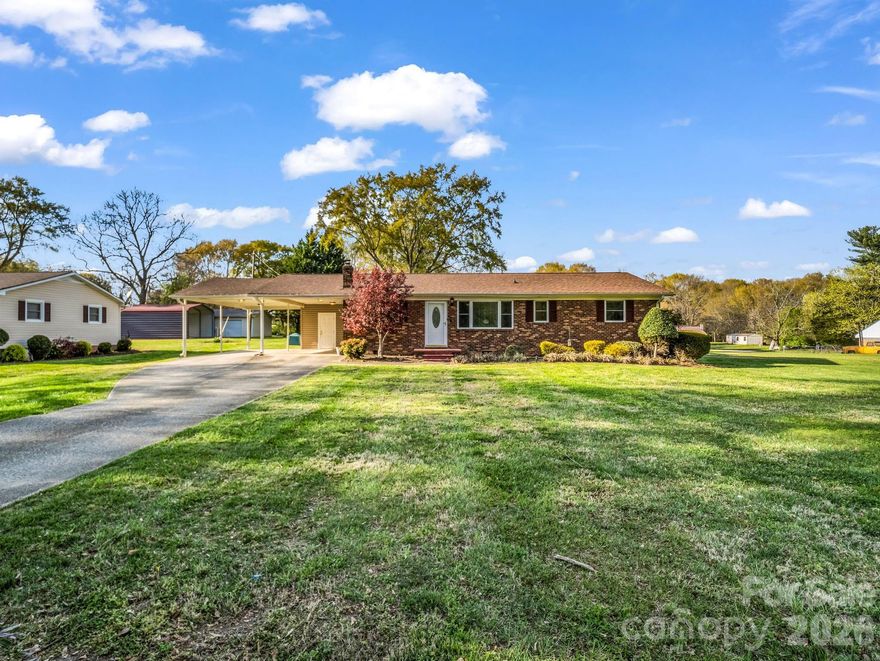 Charming well-maintained 3-bedroom, 1.5-bath brick ranch priced to move!  Situated on a level .70 acre, featuring a classic exterior with great curb appeal, concrete driveway, convenient attached carport. Step inside to a warm, inviting layout perfect for everyday living and entertaining.  The home offers a functional floor plan with ample natural light and comfortable living spaces.  Outback, you'll discover your own private retreat with an in-ground pool that's perfect for relaxing on warm days, hosting gatherings, or creating lasting memories with family and friends.  The generous yard provides plenty of room for outdoor activities, gardening, or simply enjoying the peaceful surroundings and comes with a workshop with electricity and a pool house for your extras.  
Whether you are looking for a move-in-ready home or a place to add your personal touch, this property offers the perfect blend of indoor comfort and outdoor living.  Don't miss your chance to make this one yours!